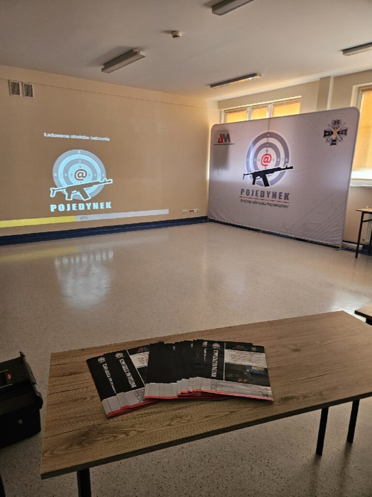 Wirtualna strzelnica na konferencji naukowej Uniwersytetu Kaliskiego im. Prezydenta Stanisława Wojciechowskiego. System szkolno-treningowy POJEDYNEK. Autocomp Management